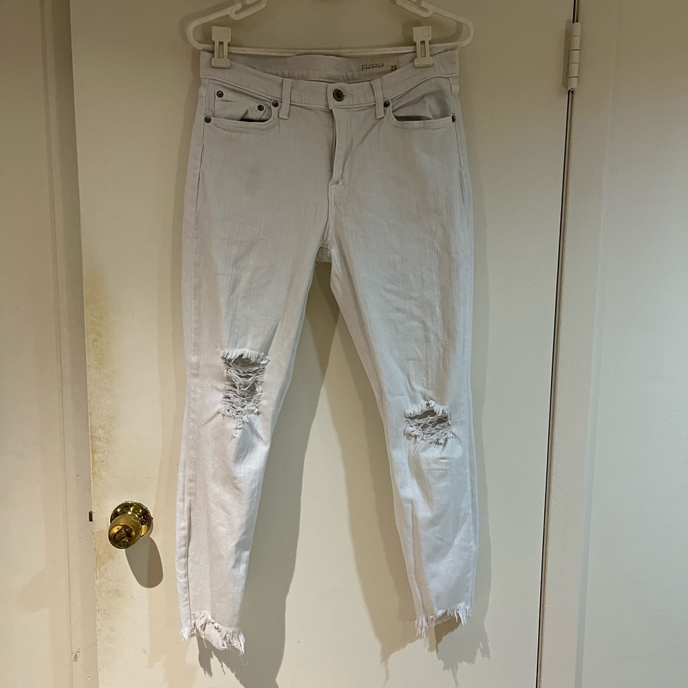 Pistola Distressed Mid Rise Jeans with Frayed Cuffs.